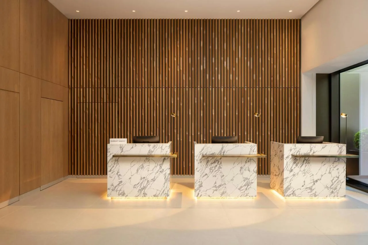 Lobby with tables and chairs at AC Hotel by Marriott Glasgow